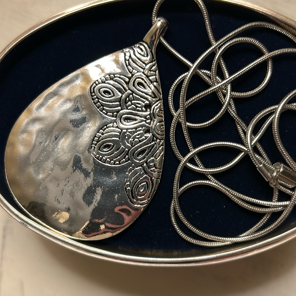 Hammered silver plated necklace with peacock feather design